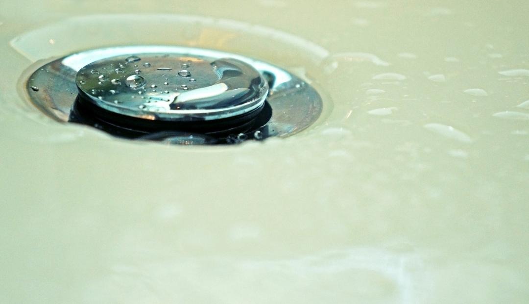 DIY Tips: Clearing A Clogged Shower Drain Cover Photo